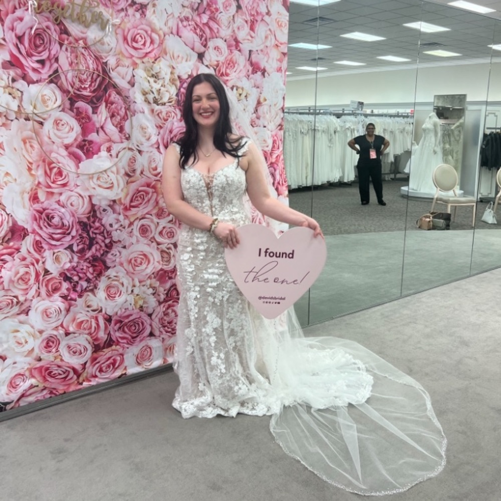 Off the shoulder, lace mermaid wedding dress. The color is Ivy Bisque. Size 6.